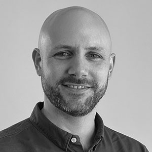 Speaker | Black and white photo of Matt Martin